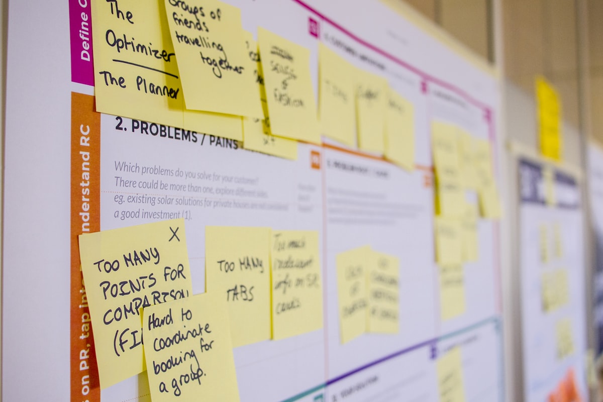 Agile model - sprint planning with sticky notes on a kanban board